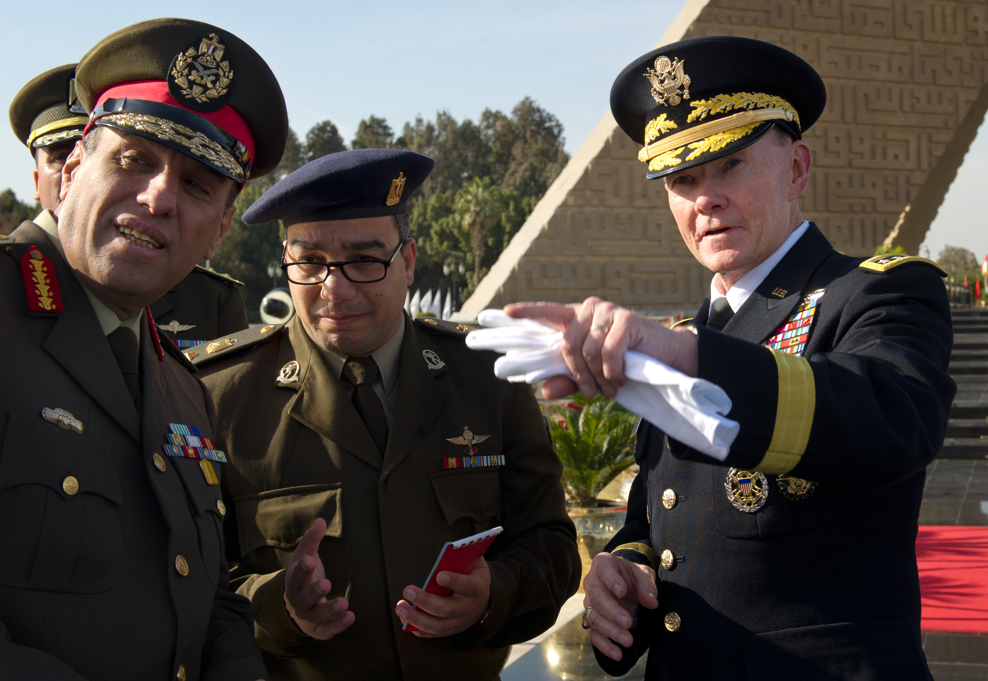 Chairman of the Joint Chiefs of Staff Gen. Martin E. Dempsey talks with senior Egyptian officers near the Egyptian Tomb of the Unknown Soldier and the tomb of President Anwar Sadat in Cairo, Egypt,  on Feb. 11, 2012.  DoD photo by D. Myles Cullen